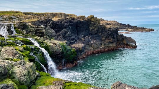 dunserverick-falls-flowing-to-sea